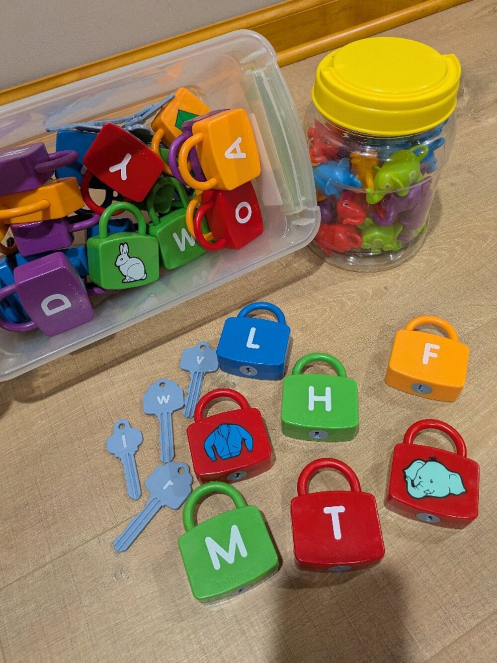 Two Alphabet ABC Learning Toys Locks & Keys ABC Elephants
